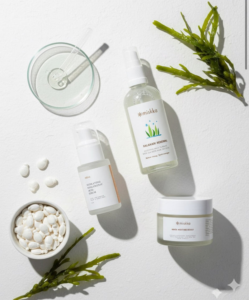 Best ingredients for dry skin, featuring hydrating skincare products and natural extracts on a white background.